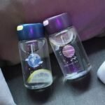 adoptez le style durable avec la gourde cosmo en verre en verre 331 1