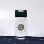 adoptez le style durable avec la gourde cosmo en verre vert en verre 590 1
