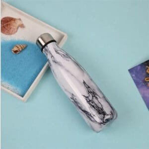 Gourde Inox Isotherme Marbrée: élégance Et Performance Au Quotidien!